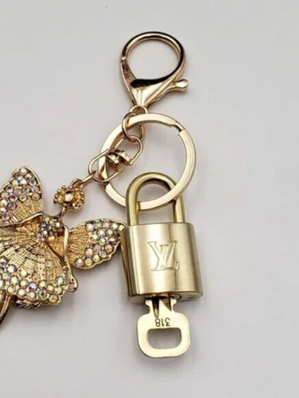 Authentic LV Gold Padlock & Key 🔑 Designer Bag Charm w/ Unbranded Fairy Charm - Picture 6 of 7
